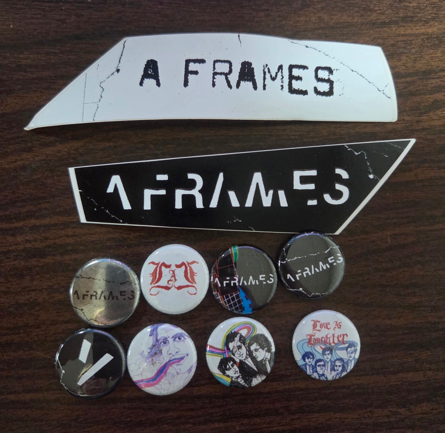 A Frames - Promotional Stickers and Pins